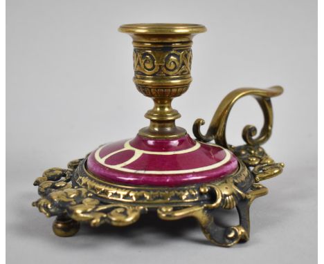 A Late 19th Century Brass and Ceramic Bedchamber Stick with Maskhead and Scrolled and Pierced Border, 9cm high 