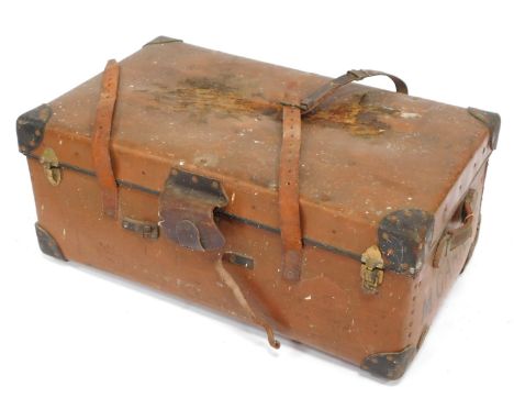 A canvas bound brown trunk, inscribed M Garner, 36cm high, 45cm wide, 52cm deep.