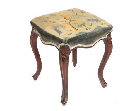 A Victorian rosewood stool, the blue and cream tapestry floral seat on outsplayed and carved mahogany legs, 43cm high, the to