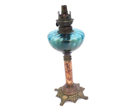 A Victorian glass oil lamp, with a turquoise glass shade on turned marble effect column, with brass base, 33cm high. 