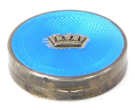 A George V Gieves Ltd silver and blue enamel compact, with a light blue enamel top and raised crown motif, Birmingham 1931, 5