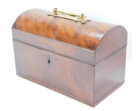 A late 19thC mahogany tea caddy, with domed top and brass swing handle, with fitted interior, one lid missing, 17cm high, 24c