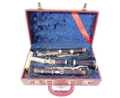 A Boosey &amp; Hawkes vintage clarinet, in fitted case. 
