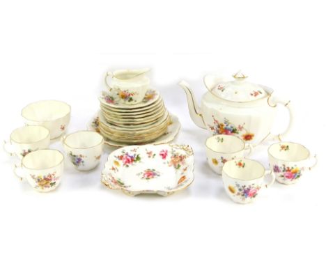 A Royal Crown Derby part tea service decorated in the Derby Posies pattern, comprising teapot, milk jug, sugar bowl, six cups