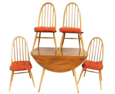 An Ercol light elm table and chairs, the drop leaf kitchen table on tapered supports with four stick back chairs, the table 7