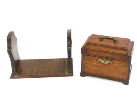 A 19thC mahogany tea caddy, canted top with brass swing handle and keyhole, on bracket feet, 20cm high, 22cm wide, 15cm deep,