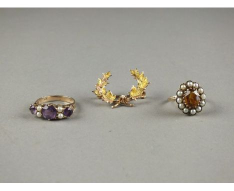 A 9ct gold citrine and split pearl cluster ring, together with an amethyst and pearl dress ring and a seed pearl set yellow m