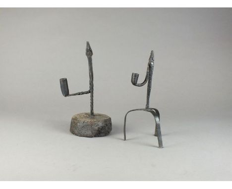 A wrought iron rush light and taper stick holder, 18th/19th century with rope twist column on oak plinth, 29cm high and anoth