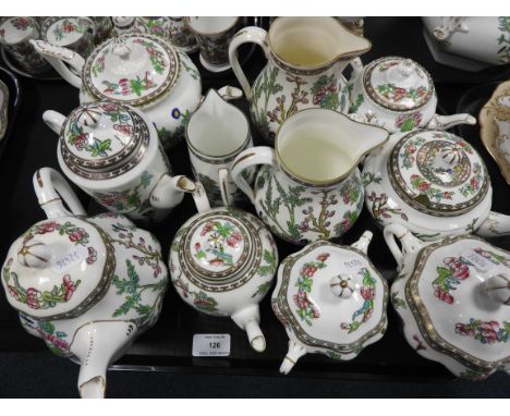 A large collection of Coalport late 19th/early 20th century Indian Tree decorated tea and dinner wares, including a large mea