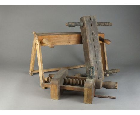 A bench mounted beech framed A-frame clamp, a hand held clamp and another similar (3)