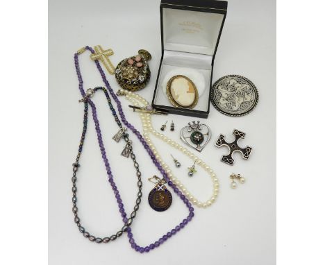 An early Ola Gorie cross brooch hallmarked Edinburgh 1973, a Caithness glass and silver Luckenbooth brooch, amethyst beads, 9