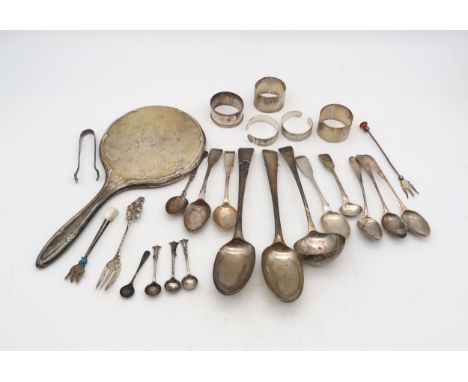 A collection of silver including a pair of George II bottom marked table spoons, London 1736, in the beaded Old English patte