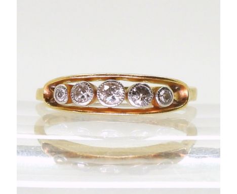 An 18ct gold vintage five stone diamond ring, set with estimated approx 0.18cts, finger size M1/2, weight 2.6gms Condition Re