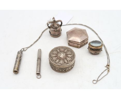 A collection of silver and white metal, including a pill box stamped 925 in the form of a crown, another rectangular example,