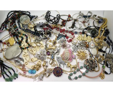 A Vivienne Westwood necklace, Butler &amp; Wilson sun brooch, items by Weiss, A&amp;S, a Danish bangle by J.Hull, and good an