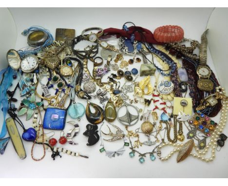 A collection of vintage costume jewellery to include, a Butler &amp; Wilson Lamb &amp; Wool brooch, a Dior heart shaped penda