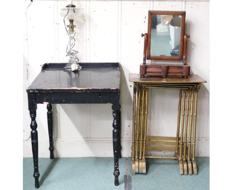 A lot comprising black painted writing desk, 82cm high x 61cm wide x 62cm deep, gilt painted nest of four tables, 72cm high x