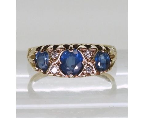 A 9ct gold sapphire and diamond ring, size K, weight 1.7gms Condition Report:Available upon request