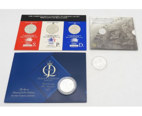 A Chinese 2007 10 Yuan Panda fine silver coin, Royal Mint SS Gairsoppa Britannia 2014 quarter-ounce silver coin and Elizabeth