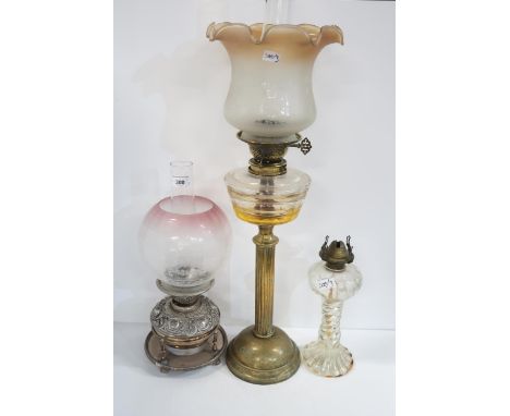 An EP oil lamp with etched glass shade, together with two other oil lamps Condition Report:Available upon request
