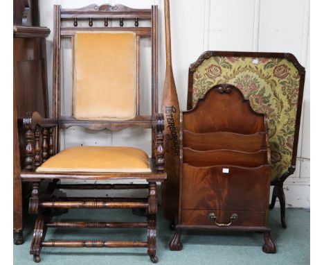 A lot comprising American style rocking chair, tapestry fire screen, mahogany magazine rack and an oar (4) Condition Report:A