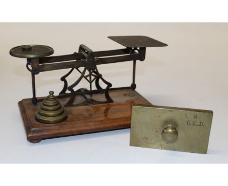 A set of Edwardian Avery postal scales with weights