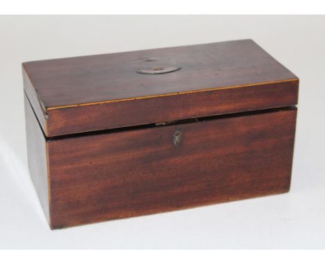 A George III mahogany oblong tea caddy, fitted with a glass mixing bowl, width 30.5cm
