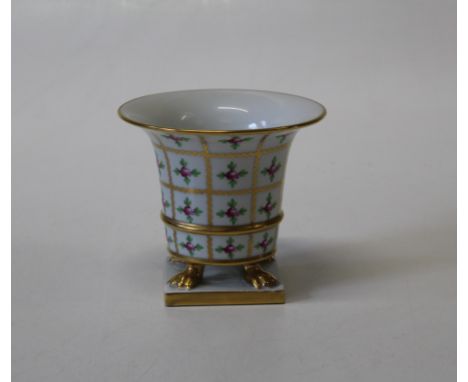 A Herend porcelain cachepot of trumpet form, rose and gilt decorated, standing on pawfeet and square plinth. Blue printed mar