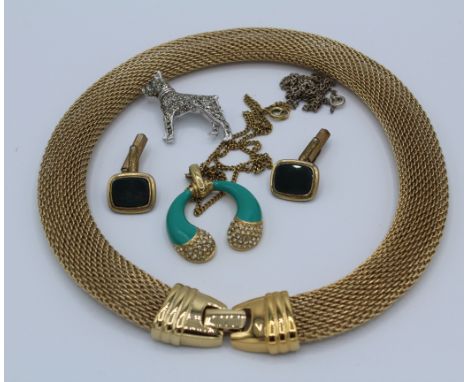 A collection of costume jewellery comprising a gold fone collar, a marcasite set boxer and two hunting brooches