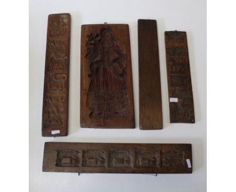 Treen; five various 18th/19th century double sided intaglio carved oak and sycamore panel, probably for culinary use, length 