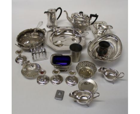A nice collection of older silver plate to include candlesticks, gravy boats, a chocolate pot, teapot, butterdish, cake baske