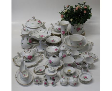 An extensive collection of Meissen Pink Rose tableware, 20th century. Comprising six 32 1/2 cm chargers, six dinner, salad an