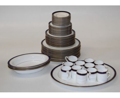 A Royal Worcester Howard part dinner service, comprising twelve dinner plates, salad plates, coffee cans and saucers, eleven 
