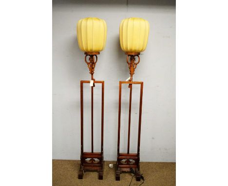 A pair of Chinese hardwood adjustable standard lamps, modern, with lantern style shades, 190cms high (in lowered position)