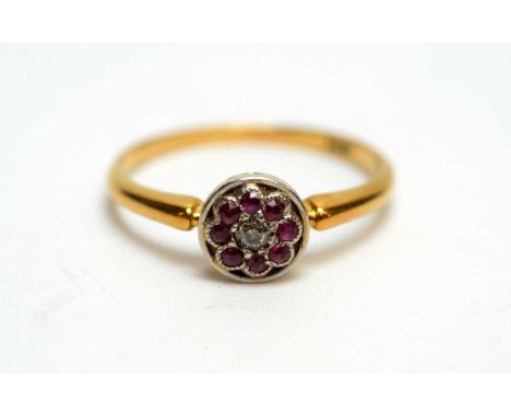 An Edwardian ruby and diamond cluster ring, on 18ct yellow gold shank, ring size P, 2.4g gross.