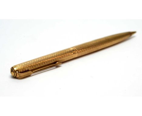A 9ct yellow gold Parker propelling pencil, with engine turned design, 23.8g gross. 