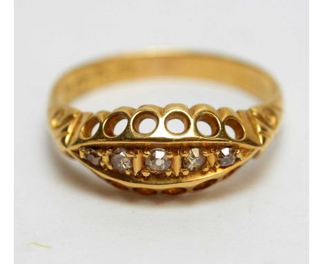A five stone Edwardian diamond ring, the old cut diamonds in 18ct yellow gold mount and shank, Chester 1909, ring size K, 2.3