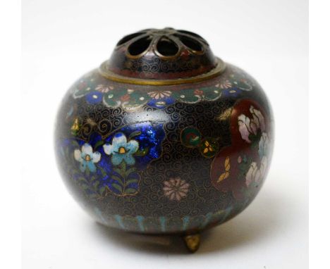 A Chinese cloisonne enamel censer and cover, decorated with flowers, raised on three splayed brass legs. 
