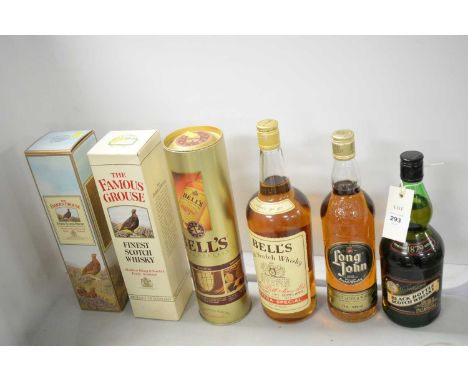 A selection of bottles of whisky, including: two bottles of The Famous Grouse, each in box; two bottles of Bell’s Extra Speci