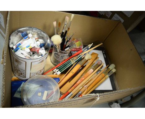 A collection of artists materials, including paint brushes, paints, pencils, light box, and other items, one box. 
