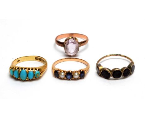 An Edwardian turquoise ring, the five graduated cabochons on 18ct yellow gold shank, Birmingham 1904, ring size M; a sapphire