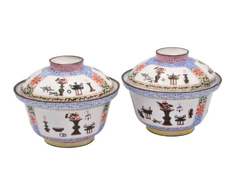 A PAIR OF CANTON ENAMEL BOWLS AND COVERS, QING DYNASTY, QIANLONG PERIOD, 1736 – 1795Each of ogee form, painted with panels of