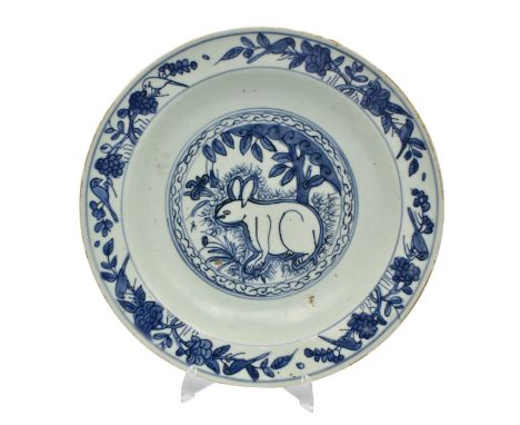 A CHINESE BLUE AND WHITE PORCELAIN 'HARE AND MOON’ DISH, MING DYNASTY, JIAJING PERIOD, 1522 – 1566Of deeply potted form, pain