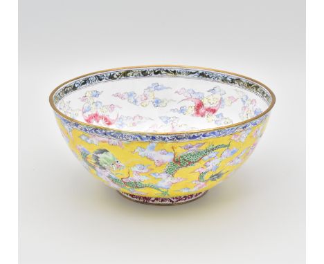 A CANTON ENAMEL 'DRAGON' BOWL, QING DYNASTY, EARLY QIANLONG PERIOD, CIRCA 1750Finely painted the exterior with three dragons 