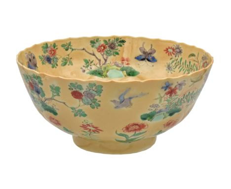 A CHINESE EXPORT ‘FAMILLE-VERTE’ AND CAFÉ AU LAIT BOWL, QING DYNASTY, KANGXI PERIOD, 1662 – 1722Of moulded lotus panelled for