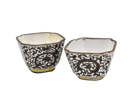 A PAIR OF CANTON ENAMEL QUATRE-LOBED WINE CUPS, QING DYNASTY, QIANLONG PERIOD, 1736 - 1795Each painted with a stylised frieze