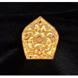 A CHINESE GOLD PETAL-SHAPED APPLIQUE, SIX DYNASTIES PERIOD, 220 – 589 AD