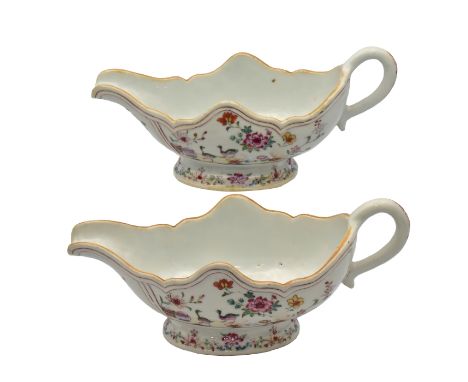 A PAIR OF CHINESE EXPORT ‘FAMILLE-ROSE’ PORCELAIN SAUCE BOATS, QING DYNASTY, QIANLONG PERIOD, CIRCA 1765Each of silver shape 