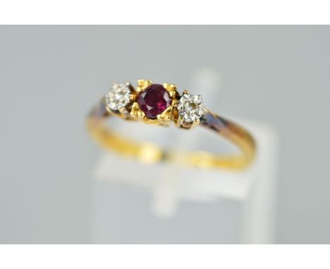 A MODERN RUBY AND DIAMOND THREE STONE RING, ring size N, stamped '18ct', approximate gross weight 3.0 grams