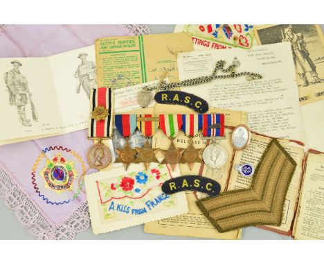 A FOLDER CONTAINING MEDALS AND EPHEMERA, to a soldier in the RASC, as follows, 1939-45, Africa (8th Army bar), Italy, France 